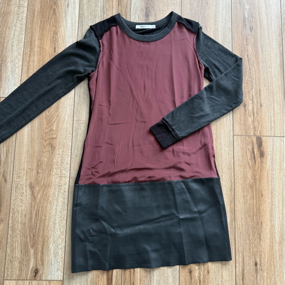 Maroon silk, black and grey knit, and black faux leather dress.